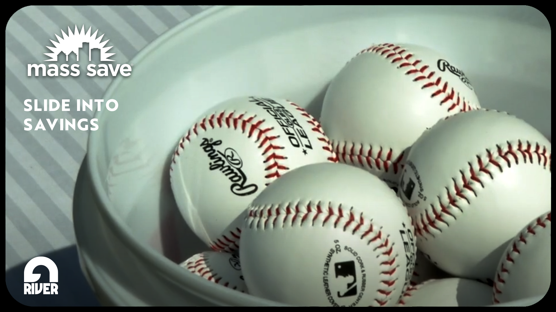 Screenshot of a video created by Granite River Studios, in partnership with Mass Save, featuring a bowl full of baseballs.