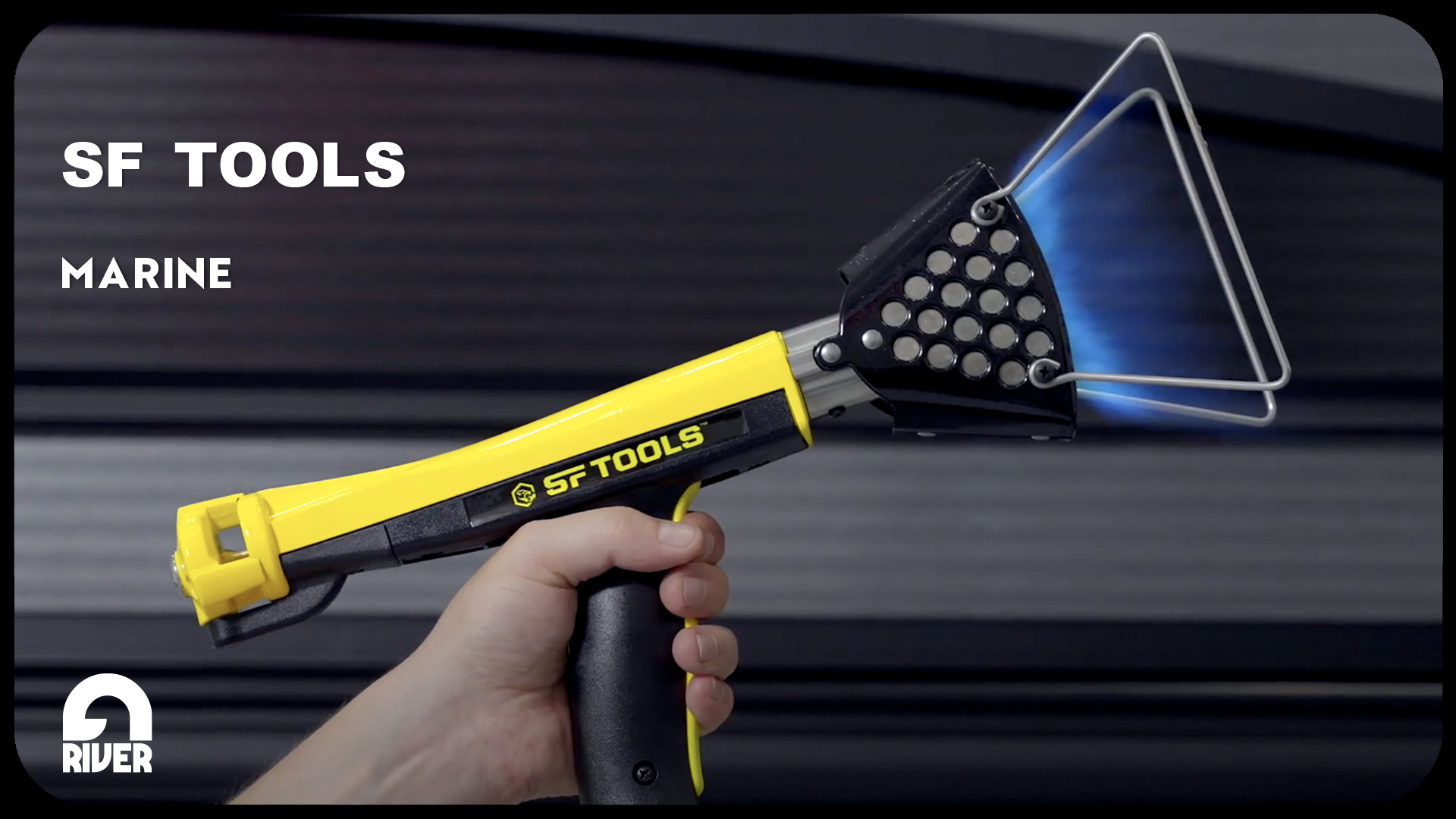 SF Tools heat shrinking tool being held by a hand, as part of a rebranding video production.