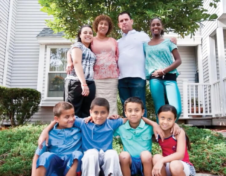 A happy family giving their professionally filmed video testimonial.